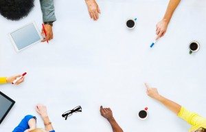 Group of Business People Planning for a New Project - XLerant
